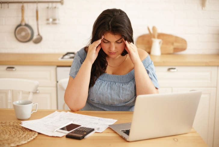 Overwhelmed person facing many financial decisions