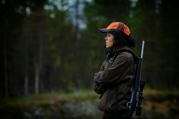 What legal requirements must you consider when selecting a firearm for hunting?