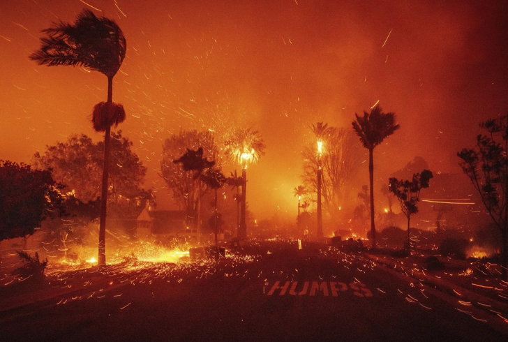 LA fires rapidly spread, engulfing thousands of acres and threatening Malibu